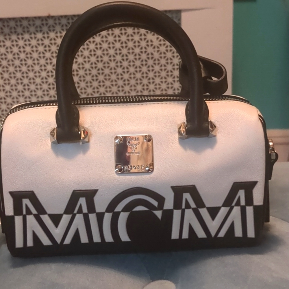 BRAND NEW AUTHENTIC MCM  mini bag with chain for crossbody. Never Worn
